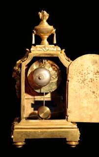 The Back of the Clock with the Cover Open Showing the Movement with 
