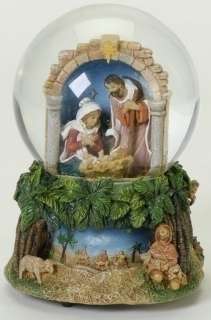 This wind up musical snow globe features a nativity scene and plays OH 