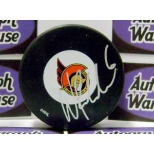 Wade Redden Autographed Hockey Puck (Ottawa Senators)