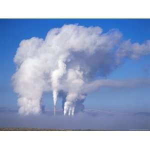 Pollution from Smoke Stacks Created by a Coal Fired Enery Plant Across 