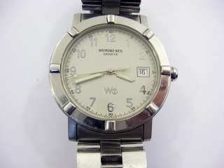 FOR SALE IS A USED RAYMOND WEIL MENS SWISS MADE W1 6120 THAT IS IN 