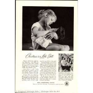   Bell Telephone Christmas is a little doll Vintage Ad