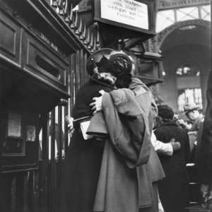  Station Sharing Farewell Kiss Before He Ships Off to War During WWII 