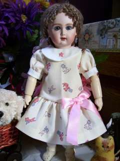 description this auction is for a pretty all cotton dress made to fit 