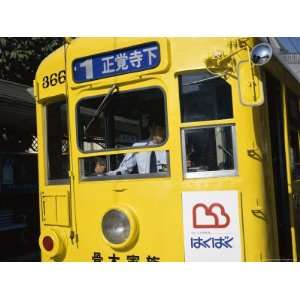 Yellow Public Tram at Matsuyama, Nagasaki, Island of Kyushu, Japan 