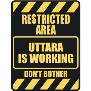   RESTRICTED AREA UTTARA IS WORKING  PARKING SIGN