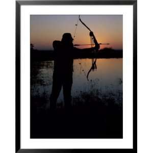 Silhouette of Hunter with Bow and Arrow Superstock Photography 