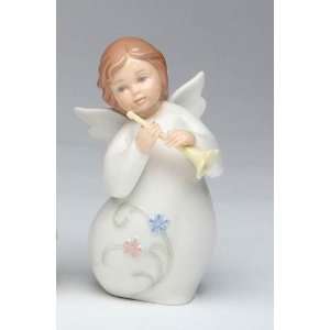   Little Angel Statue With Flowers Playing A Trumpet