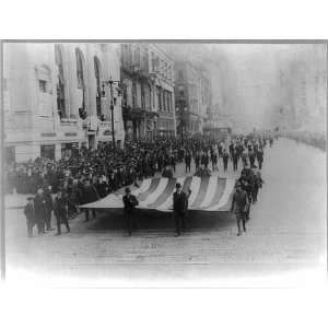   York City   Parade,Men carrying large U.S. flag down the street,1916