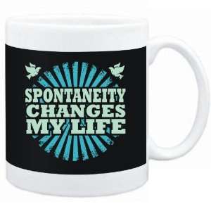  Mug Black  Spontaneity changes my life  Hobbies Sports 