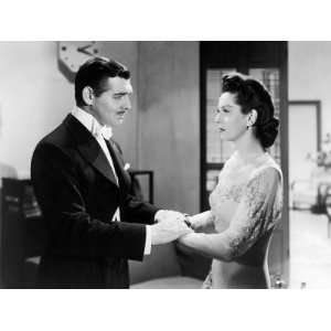  Clark Gable and Rosalind Russell in a Scene from They Met 