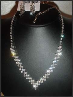 silvertone metal set clear brillant crystals neckace adjustable length 