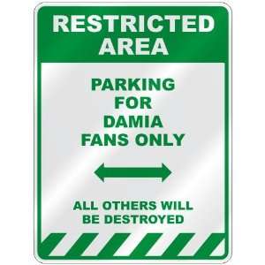   PARKING FOR DAMIA FANS ONLY  PARKING SIGN