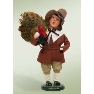   Boy Pilgrim Holding a Turkey Caroler Figure