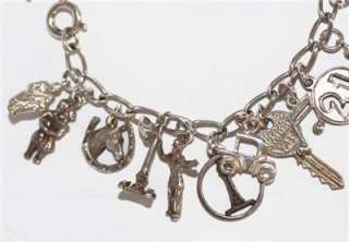 LOADED VINTAGE STERLING SILVER CHARM BRACELET WITH 25 CHARMS  