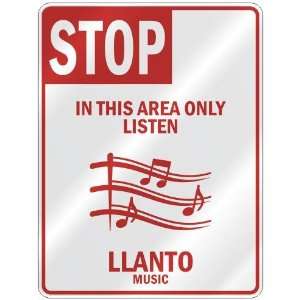   IN THIS AREA ONLY LISTEN LLANTO  PARKING SIGN MUSIC