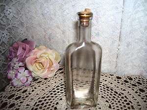 OLD MEDICINE BOTTLE CLEAR GLASS WITH CORK  