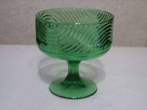 BRODY GREEN GLASS FOOTED VASE RIBBED SWIRL SIDES  