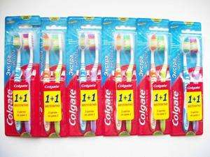 12 Colgate toothbrushes bi level with tongue scraper  