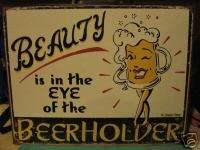 Tin Sign  Beauty Is In The Eye Of The Beer Holder  