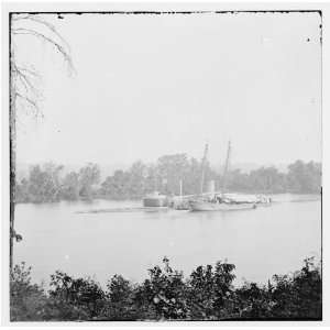  James River,Virginia. U.S.S. monitor CANONICUS taking coal 