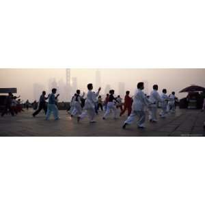 People Doing Early Morning TAi Chi Exercises in the Huangpu Park on 