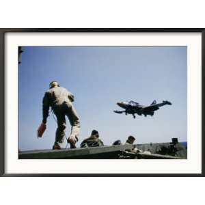 Fighter Plane Lands Onboard an Aircraft Carrier Collections Framed 