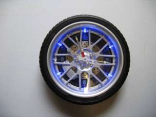 RACING SERIES 10 TIRE WALL CLOCK BLUE RED BLINKING  