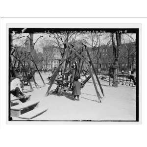   in playground swings, Hamilton Fish Park, New York