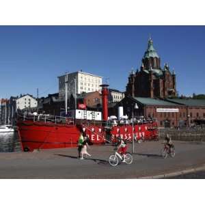 Red Boat and Restaurant at North Harbour, with Uspenski Cathedral in 