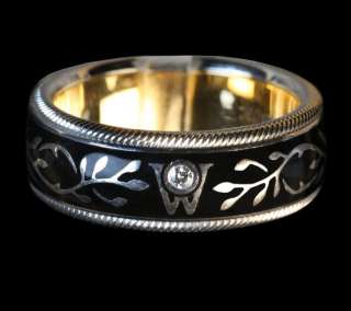   wellendorff hibiscus black spinning ceramic ring with diamond